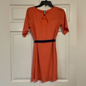 DINA BE. Bright orange dress with blue ribbon tie
